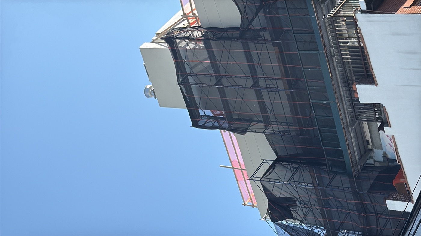 White smooth stucco new construction