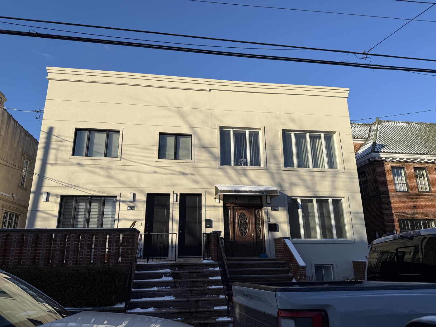 Modern beige stucco home after