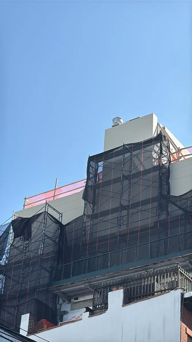 Smooth white stucco facade in Bay Ridge Brooklyn